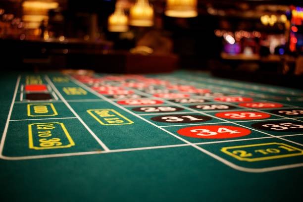 Mobile phone displaying live roulette stream and account dashboard